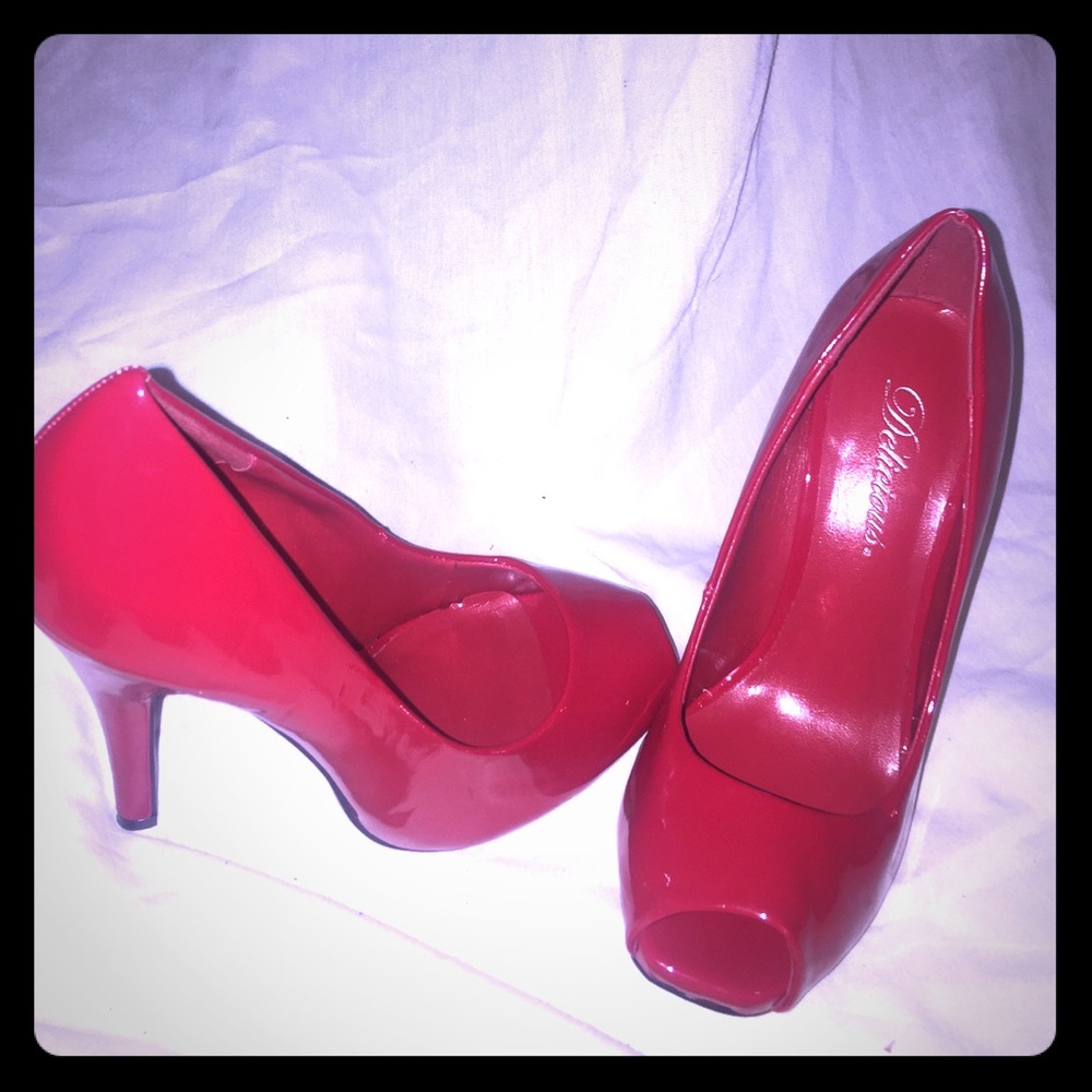 Like New peep toe pumps